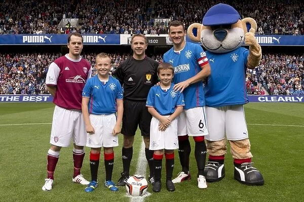 Rangers Football Club: Lee McCulloch and Mascots Celebrate Thrilling 5-1 Victory over Arbroath at Ibrox Stadium
