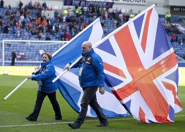 Rangers Football Club: SPFL Championship Win and Scottish Cup Triumph (2003) - Glorious Ibrox: Flag Bearers Hoist the Trophy