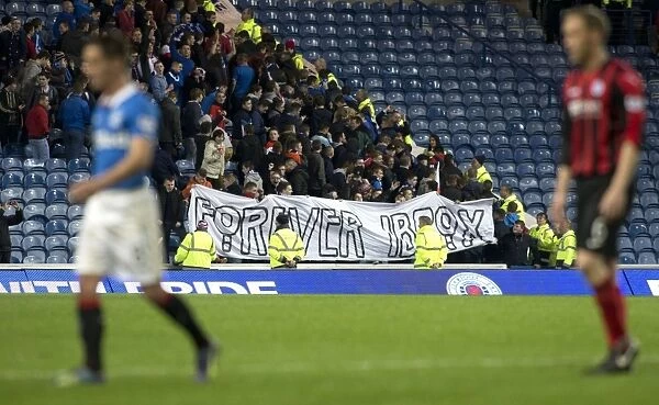 Rangers Football Club: Triumphant Fans Hoist Scottish Cup Winners 2003 Banner