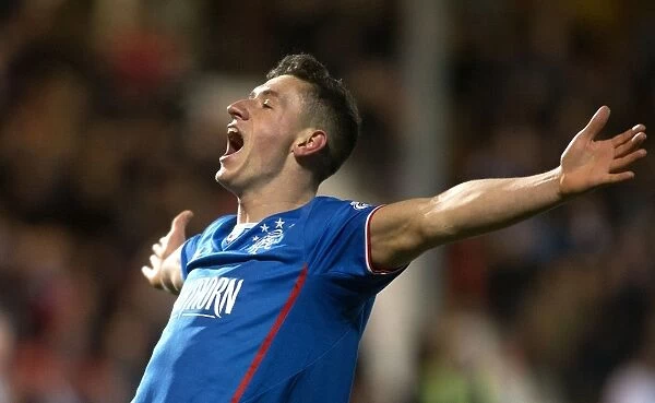 Rangers Fraser Aird: Exulting in His Scottish League One Goal Amidst Scottish Cup Champions Triumphant Atmosphere (Dunfermline Athletic vs Rangers)