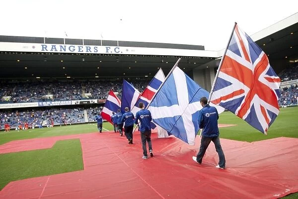 Rangers Glory: Flag Bearers Celebrate Historic 5-1 Victory Over East Stirlingshire at Ibrox Stadium