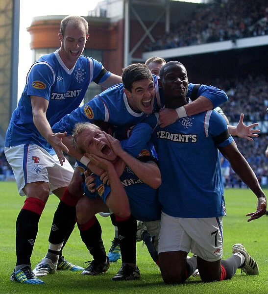 Rangers Glory: Unforgettable Moment of Victory - Naismith, Davis, Lafferty, Whittaker, and Edu Celebrate Historic 4-2 Win Over Celtic at Ibrox Stadium