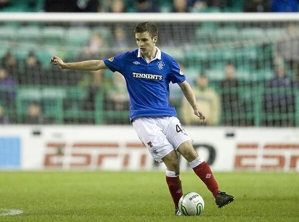Rangers Jamie Ness Scores the Decisive Goal Against Hibernian in Scottish Premier League (2-0)