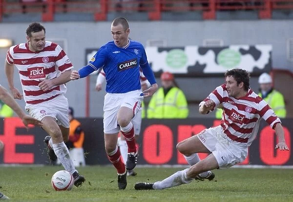 Rangers Kenny Miller Evades Hamilton's Canning and McLaughlin in Thrilling Scottish Cup Showdown