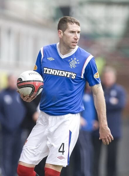 Rangers Kirk Broadfoot Leads the Charge: 1-4 Crushing Victory over Dunfermline in Scottish Premier League