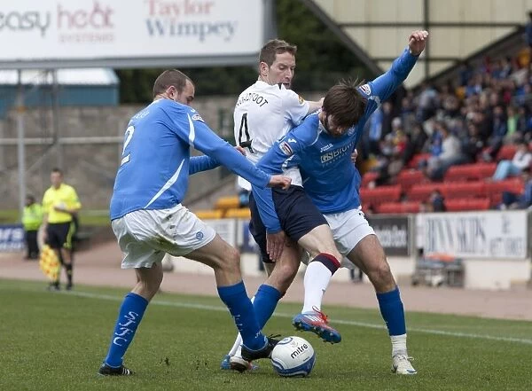 Rangers Kirk Broadfoot and Teamsmates Celebrate 4-0 Victory over St. Johnstone: Cillian Sheridan and Dave McKay Look On