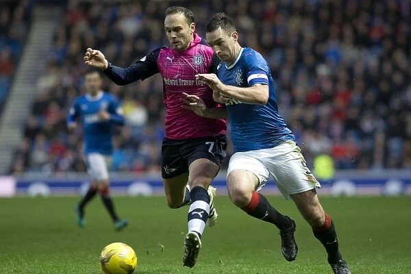 Rangers Lee Wallace Outmaneuvers Dundee's Tom Hateley in Thrilling Ladbrokes Premiership Match at Ibrox Stadium