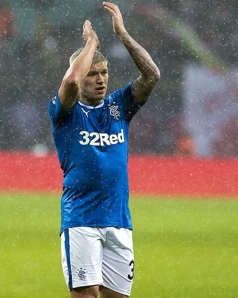 Rangers Martyn Waghorn Salutes Fans: Triumphant Moment at Red Bull Arena during RB Leipzig Friendly