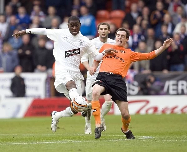 Rangers Maurice Edu Outmuscles Keith Watson: 1-2 Victory over Dundee United in Scottish Premier League