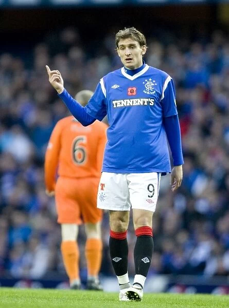 Rangers Nikica Jelavic Scores the Game-Winning Goal in a 3-1 Victory over Dundee United at Ibrox Stadium
