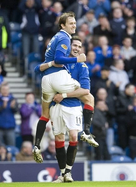 Rangers Sasa Papac and Kyle Lafferty: Celebrating Goals in Rangers 4-0 Victory Over Saint Johnstone at Ibrox Stadium (Clydesdale Bank Scottish Premier League)
