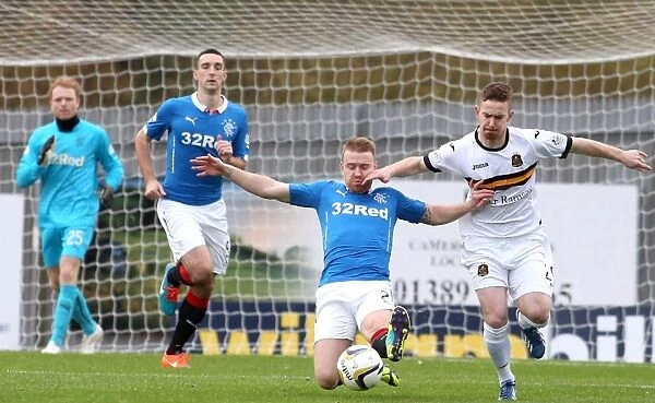 Rangers Stevie Smith Tackles Archie Campbell in Intense Scottish Cup Clash