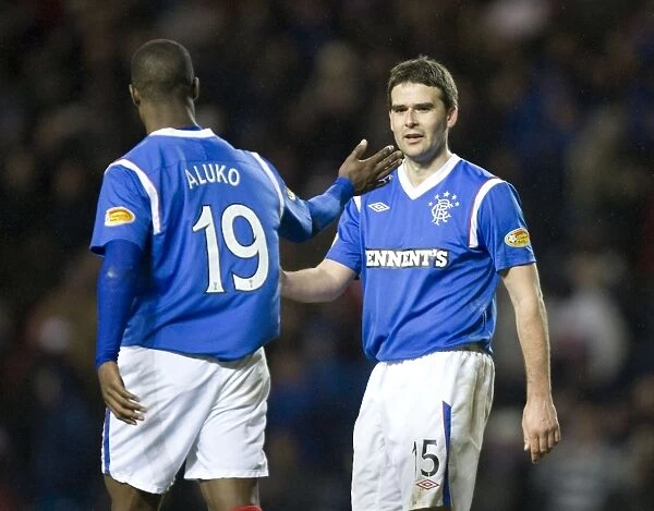 Rangers Triumph: Healy and Aluko's Euphoric Moment as they Celebrate a 3-0 Goal Against Motherwell