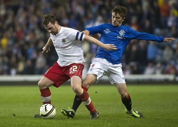 Rangers vs Linfield: Clash Between Charlie Telfer and Jamie Mulgrew at Ibrox Stadium - Rangers Lead 2-0