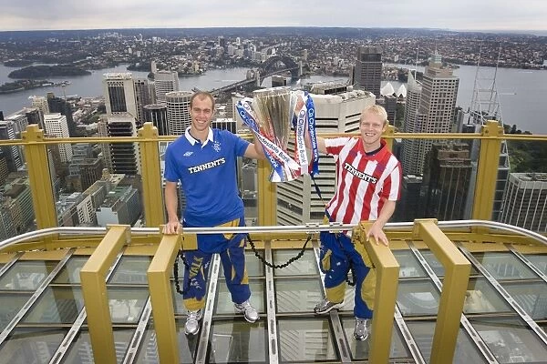 Rangers Whittaker and Naismith Celebrate SPL Title Triumph at Sydney Tower with Harbour Bridge Backdrop (Sydney Festival of Football 2010)