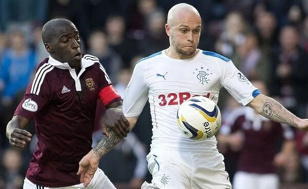 A Rivalry Revisited: Law vs Gomis at Tynecastle Stadium - Scottish Cup Clash of Legends