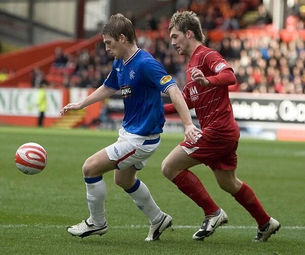 Steven Davis Scores the Thrilling Winner for Rangers at Pittodrie Stadium against Aberdeen in the Clydesdale Bank Premier League