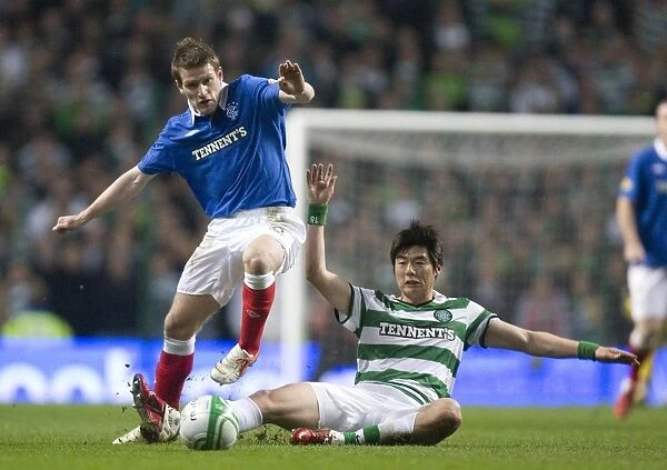Steven Davis vs. Ki Sung Yueng: A Clash of Midfield Titans in the Scottish Cup Fifth Round Replay: Celtic 1-0 Rangers