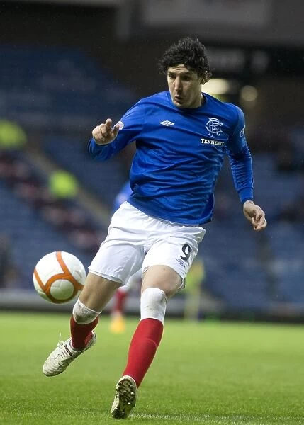 Thrilling Draw at Ibrox: Rangers and Montrose Battle it Out with Francisco Sandaza's Leading Performance (Scottish Third Division Soccer)