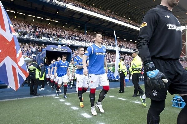 Thrilling Victory: Rangers Players Emerge Triumphant from Ibrox Stadium Tunnel (3-2)