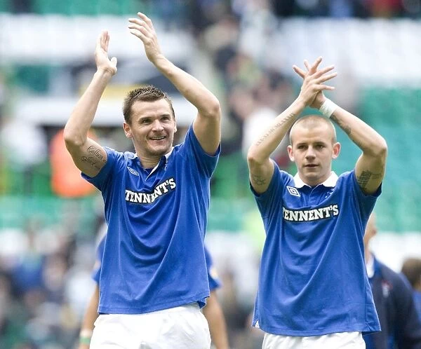 Triumphant Celebration: Lee McCulloch and Vladimir Weiss Lead Rangers to a 3-1 Victory over Celtic
