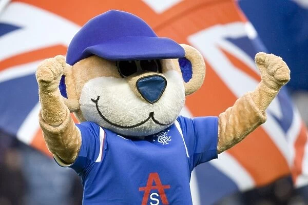 Triumphant Rangers Celebrate 3-0 Victory Over Motherwell at Ibrox Stadium with Broxi Bear