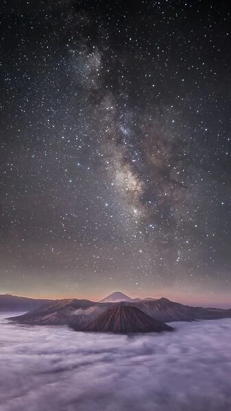 Dreamlike Milky way and mountain range before morning sunrise at bromo volcano mountain with Vertical 16: 9 format, east java, indonesia