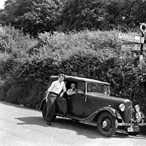 Two men with Austin car