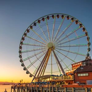 Seattles Great Wheel on Pier 57 at golden hour, Seattle, Washington State, United