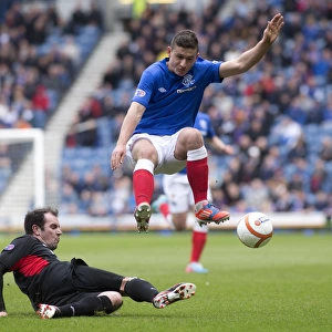Fraser Aird's Soaring Leap: Rangers Take 2-0 Lead Over Clyde at Ibrox Stadium