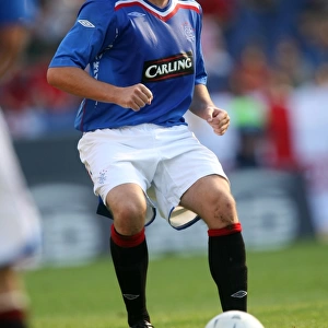 Kris Boyd Scores the Winning Goal: Rangers FC Triumphs Over Hannover 96 (1-0)