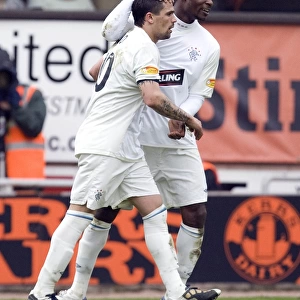 Nacho Novo and Maurice Edu: Unforgettable Moment of Triumph - Rangers 2-1 Win Against Dundee United in the Scottish Premier League at Tannadice Park
