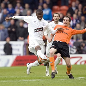 Rangers Maurice Edu Outmuscles Keith Watson: 1-2 Victory over Dundee United in Scottish Premier League