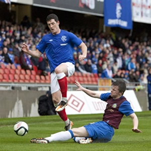 Rangers Ross Perry in action