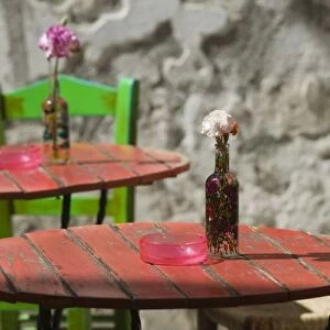 GREECE, CRETE, Hania Province, Hania: Colorful Cafe Table