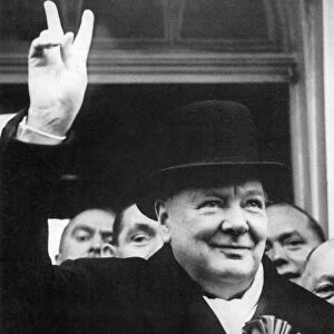 (1874-1965). English statesman and writer. Photographed flashing his V for Victory sign during WWII