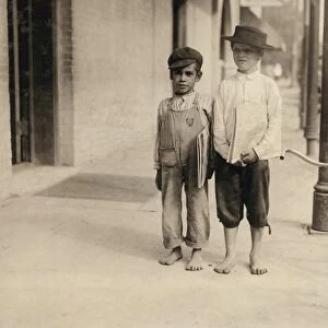 TEXAS: NEWSBOY, 1913. Two young newsboys early in the morning in San Antonio, Texas