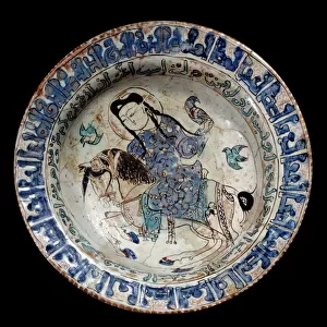 Islamic art: falconer rider dish in ceramic. The beginning of the 13th century. From Iran