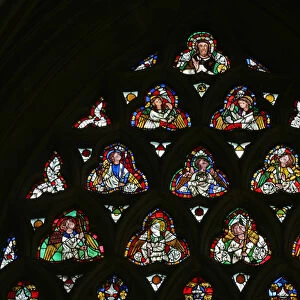 Window e-1 depicting Christ with angels carrying Instruments of the Passion