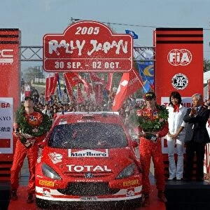 FIA World Rally Championship: Marcus Gronholm, Peugeot 307 WRC, celebrates his win on the podium