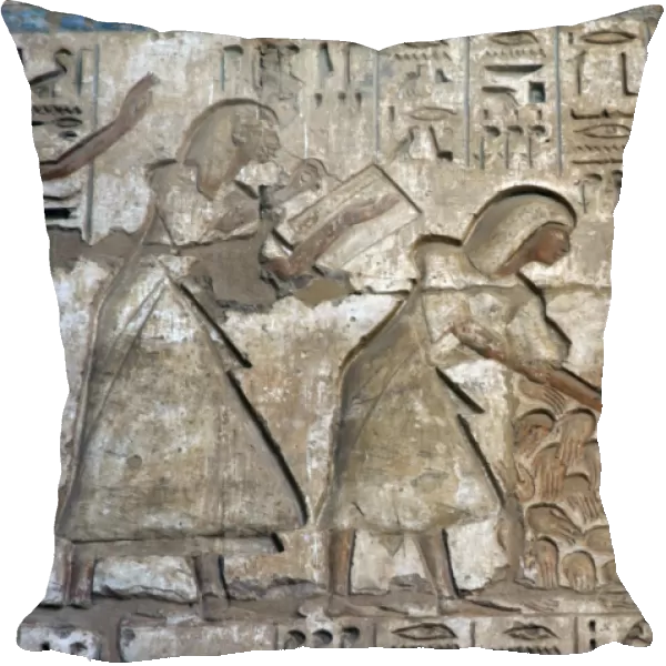 Temple of Ramses III. Officials counting the severed hands o