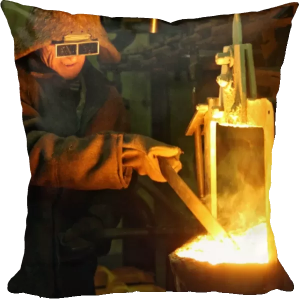 Foundry. Worker at the foundry of the Rezh Mechanical Plant