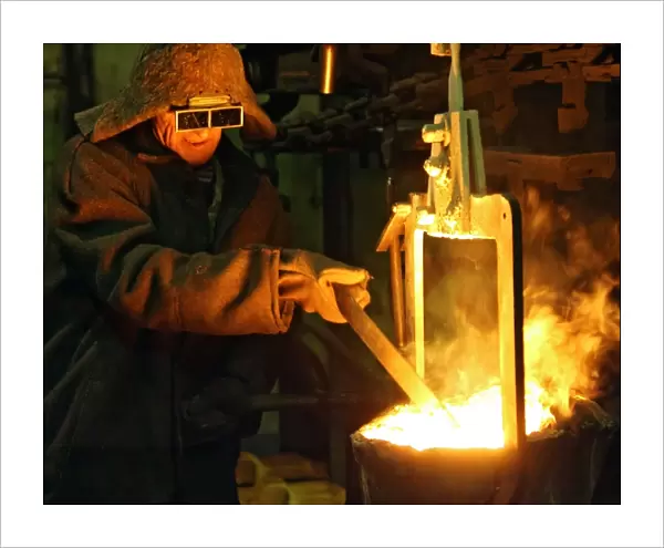 Foundry. Worker at the foundry of the Rezh Mechanical Plant