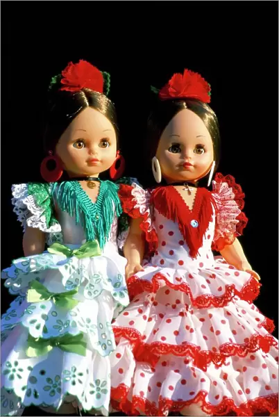 Two dolls dressed in Spanish costume