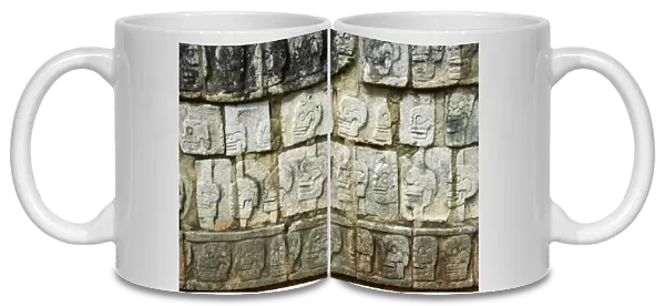 Detail of stone relief of skulls, ancient Mayan ruins, Chichten Itza, UNESCO World Heritage Site