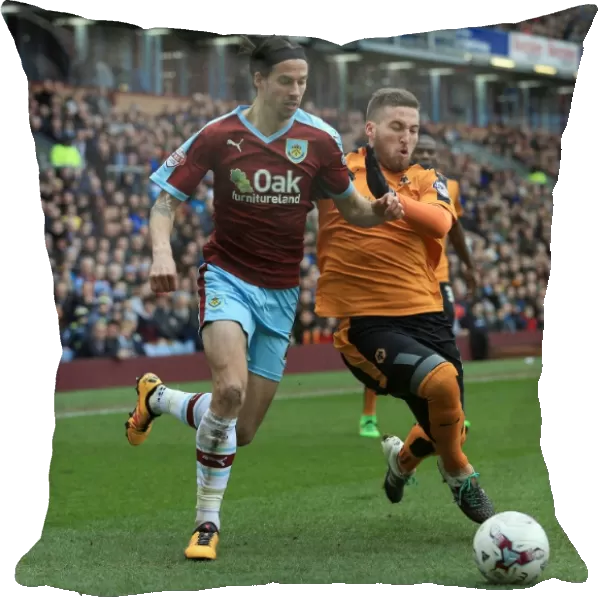 Burnley vs. Wolves: Intense Battle for the Ball between George Boyd and Matt Doherty at Turf Moor