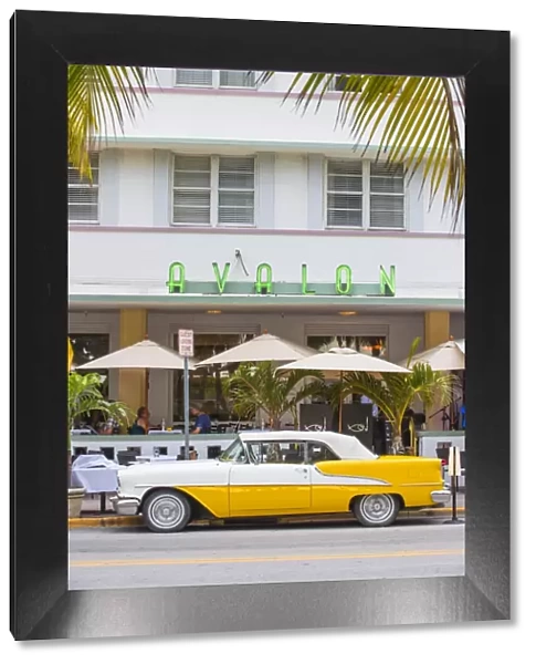 U. S. A, Miami, Miami Beach, South Beach, Ocean Drive, Yellow and white vintage car