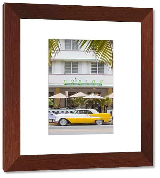 U. S. A, Miami, Miami Beach, South Beach, Ocean Drive, Yellow and white vintage car
