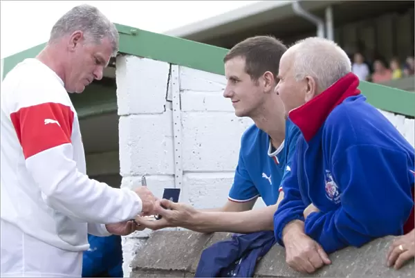 Rangers Football Club: Ian Durrant Engages with Fans at Buckie Thistle's Victoria Park - Scottish Cup Victory (2003)