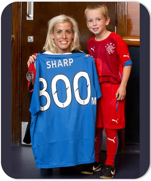 Rangers Football Club vs Hibernian: Lynsey Sharp and the Ibrox Mascot - A Celebration of Scottish Pride and Sporting Excellence